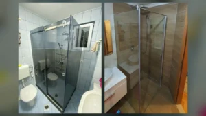 Dvije ugaone tuš kabine po mjeri iz naših radova: klizna na L sa zatamnjenim staklom uz prozor i vodokotlić, i preklopna na L sa prozirnim staklom